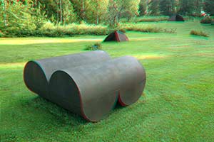 in 3D - cor-ten steel sculpture perpendicular cylinders 3