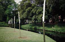 Merwestein Park in Dordrecht - environmental art - willow trees and wood/acrylic columns- an installation with Vera Röhm